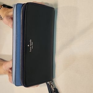Kate Spade wallet with detachable wristlet strap.